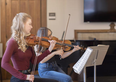 Violinists rehearsing 