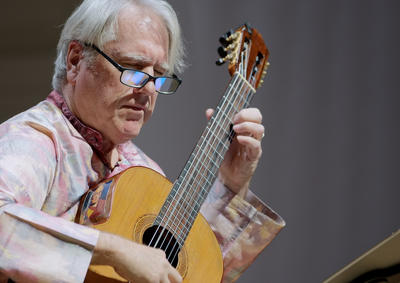 Ben Verdery playing guitar